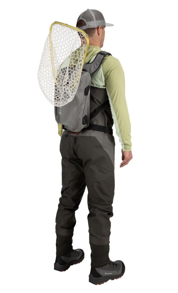 Fishing sling pack by Simms, Dry Creek Z with waterproof construction for secure gear storage.